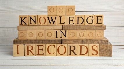 Knowledge in Records: Stacked Wooden Blocks Displaying Words on a Wooden Background for Educational Themes
