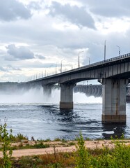 Fototapeta premium A bridge over a river on a cloudy day