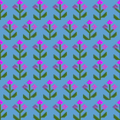 Pixel floral textile pattern with pink blossoms and green leaves on a bright blue background, repeating in a geometric grid style.
