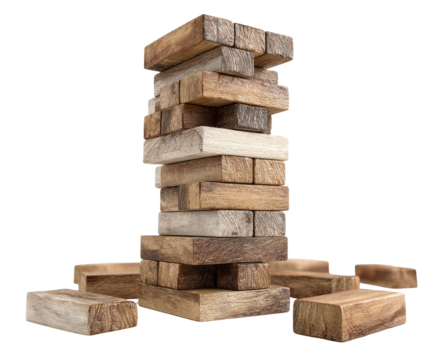 Wooden blocks stacked high, game pieces scattered