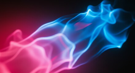 Obraz premium Colored smoke swirls against dark background