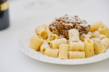 Bolognese beef onion pasta with cheese close up 1