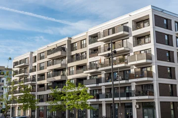 Modern gray multifamily apartment building seen in Berlin, Germany © elxeneize