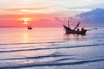 Sea sunset landscape, beautiful ocean sunrise, tropical island beach, fisherman boat, ship silhouette, blue waves, colorful pink red orange sky, water sun reflection, summer holidays, vacation, travel