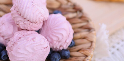 pink and purple icecream dessert with grapes and berries 