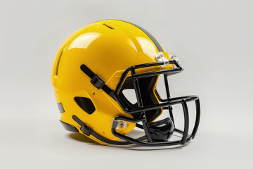 Fototapeta premium A bright yellow football helmet designed for safety in the sport. isolated on white background