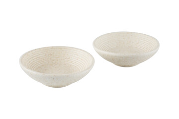 Two empty ceramic sauce dishes placed side by side on a clean, white background, showcasing their minimalist design — for food presentations, kitchenware advertising, or culinary-themed visuals.