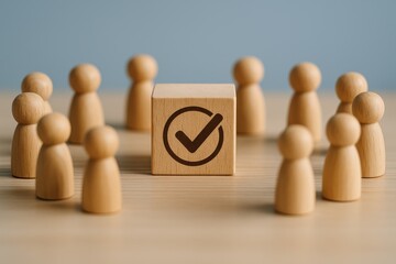 Wooden figures surrounding a block with a checkmark symbol representing approval and consensus