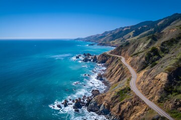 Fototapeta premium Coastal Road with Ocean Waves, Sunny Day