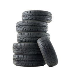 Stacked car tires against black background