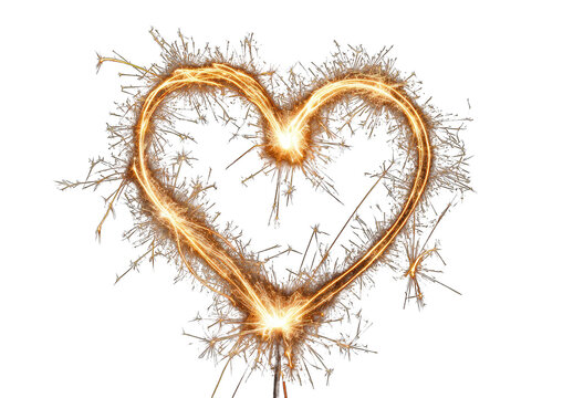 Heart-shaped sparkler against black background