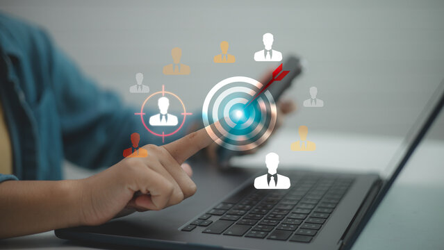 Digital marketing target concept with user selecting audience on virtual screen. Business strategy, customer segmentation, personalization, and online advertising precision technology.