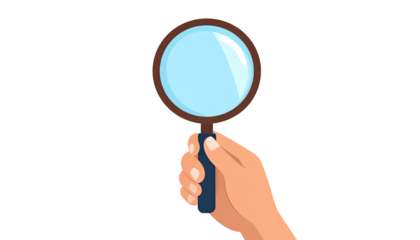 Hand holding a magnifying glass (3)