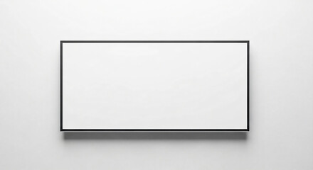 Obraz premium Minimalist Black Frame on White Wall: Modern Art Display