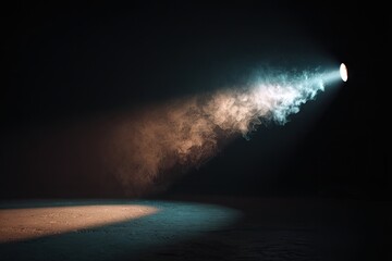 Colorful Spotlight Beam Illuminating a Dark Stage with Smoke.