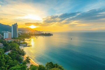 Coastal city skyline with ocean and tropical trees at golden sunset