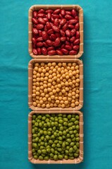 Legumes Stack Overhead View on Turquoise Background Healthy Beans