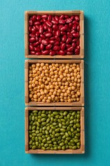 Legumes in Wooden Crates Top View with Kidney Beans Chickpeas and Edamame