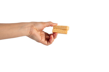 Wafer biscuit with chocolate cream and hand isolated on transparent background
