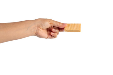 Wafer biscuit with chocolate cream and hand isolated on transparent background