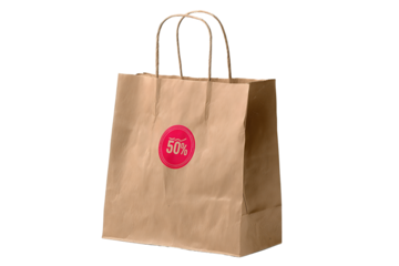 Paper shopping bag in kraft with twisted handles, glossy red circular 50% badge sticker, subtle creases and gusset folds, isolated on transparent background.