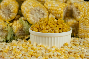 Healthy Canned Corn Served In Bowl With Fresh Corn Cobs.