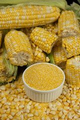 Fresh Corn Cobs with Raw Corn Grits in Bowl