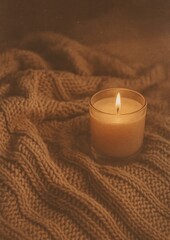 Cozy candlelit knitted warmth.