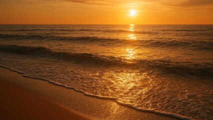 Golden sunset over ocean waves.