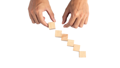 Hands arranging wooden blocks in line on transparent background symbolizing business strategy png
