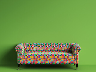 Classic tufted sofa in multicolor patches fabric on green background with copy space