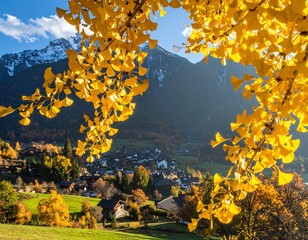 Autumnal village nestled in a valley, framed by vibrant ginkgo leaves and snow-capped mountains