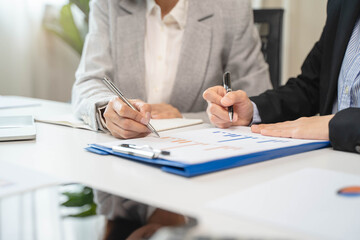 Financial consult planning investor asses and present to client, Close up shot client and advisor...