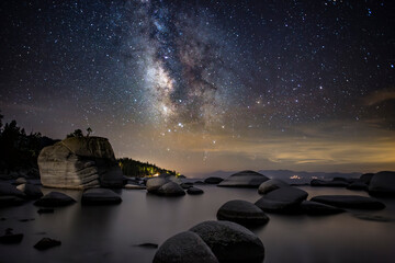 The Milky Way on display over bonsai rock
