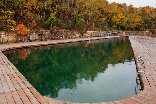 Zakrz&oacute;wek Quarry, Krakow. Floating swimming pool. Cloudy autumn day