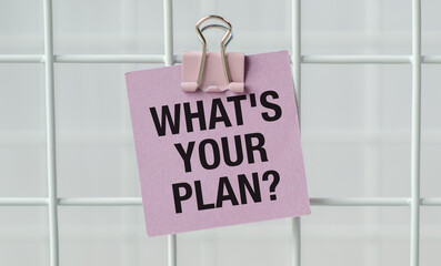 What's Your Plan word on pink card on a light background, business concept