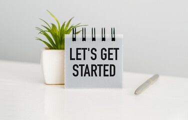 Written Let's Get Started - concept of bonus year end or holiday gift money for team staff employee to say thanks