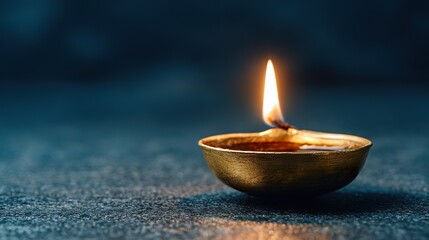 A golden oil lamp glows warmly against a dark backdrop, its flickering flame creating a cozy atmosphere.