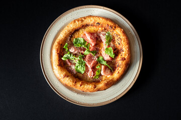 Delectable Pizza Delights: This top-down view showcases a perfectly baked pizza adorned with fresh ingredients, evoking sensations of culinary enjoyment. 