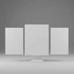 Blank three-screen computer monitor mockup with grey background