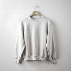 Blank white sweatshirt mockup on wooden hanger against plain wall background