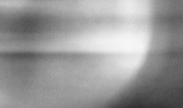 Stippled grain texture background. Black sprayed dots gradient wallpaper. Rough noisy sand dotted backdrop.