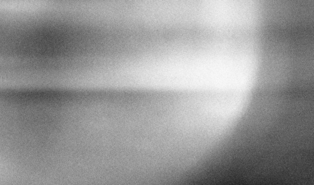 Stippled grain texture background. Black sprayed dots gradient wallpaper. Rough noisy sand dotted backdrop.