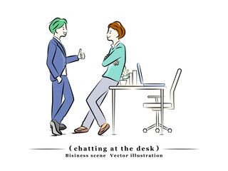 デスクで雑談するビジネスパーソン｜ビジネスシーン