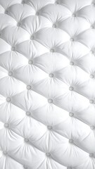 Close-up of a white tufted upholstery pattern