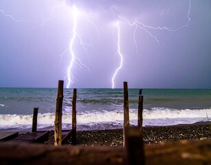 Dramatic lightning storm over a beach