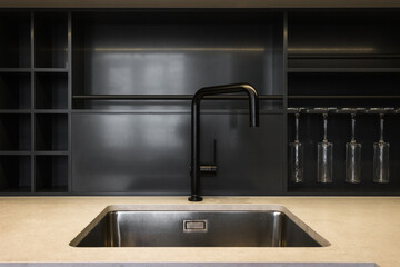 kitchen faucet on a stylish metal sink