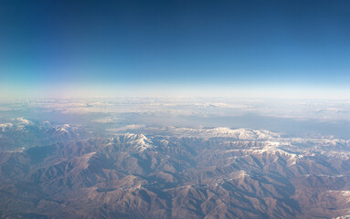 Naklejka premium Plane Window View, Snow Mountains Aircraft Fly Landscape, Looking from Plane Cabin