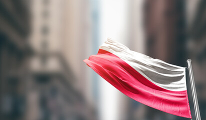 Poland national flag waving on street. A beautiful with mast with blur buildings. Poland national...