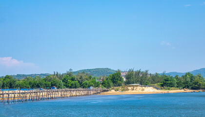 Ong Cop (Mr. Tiger) wooden bridge across Phu Ngan river in Song Cau, Phu Yen - one of the longest wooden bridges in central Vietnam - can be a shortcut to the famous Ganh Da Dia scenic spot